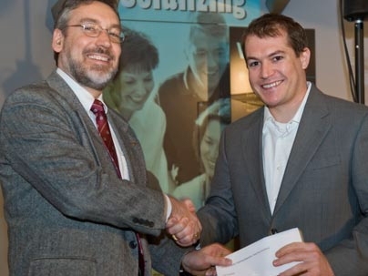 Department of Electrical Engineering and Computer Science Associate Department Head Duane Boning presents the Harold Hazen Teaching Award to Jay Fucetola for many terms of 6.042.
