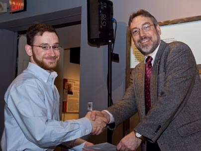 Department of Electrical Engineering and Computer Science Associate Department Head Duane Boning presents the Frederick C. Hennie Teaching Award to Max Goldman for 6.005, 6.831.