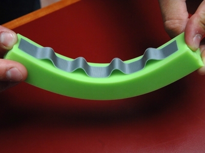 MIT mathematician Pedro Reis demonstrates the delamination that occurs when a surface is compressed: The tape detaches from the surface and forms blisters of uniform size and spacing.
