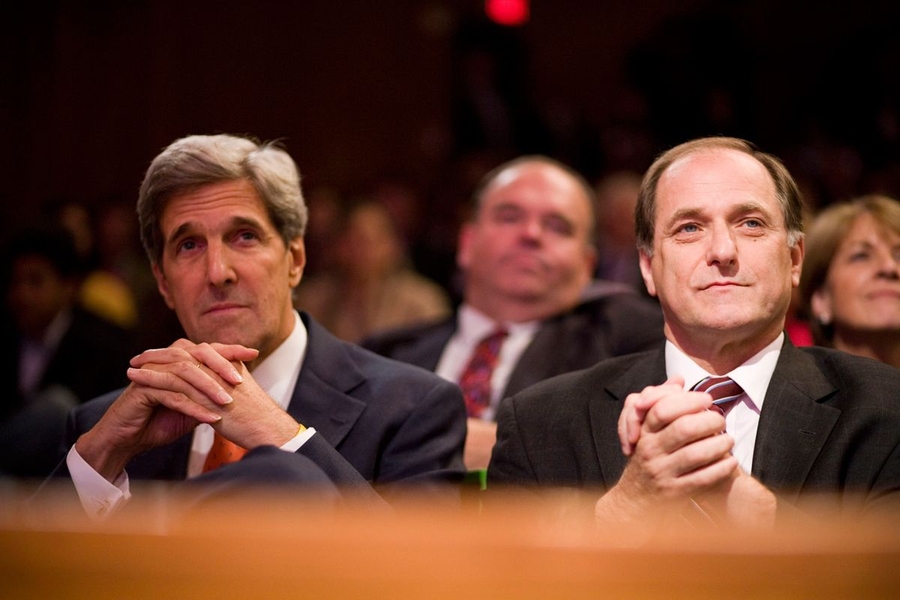 U.S. Sen. John Kerry and U.S. Rep. Michael Capuano listen to President Obama's speech.