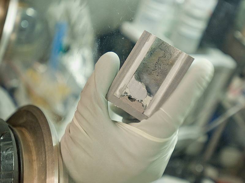 After being tested and then cooled down so that the molten metal solidifies, test batteries are sliced in half to so that their internal structure can be studied.