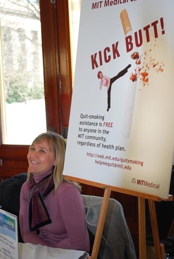 Lauren Mayhew, a program manager in MIT Medical's Center for Health Promotion and Wellness, offers quit-smoking information at the getfit@mit kickoff event.
