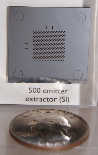 Professor Paulo Lozano’s design relies on extracting and accelerating ions from a surface that is the size of a quarter. The plate is fabricated at MIT’s Microsystems Technology Laboratories.