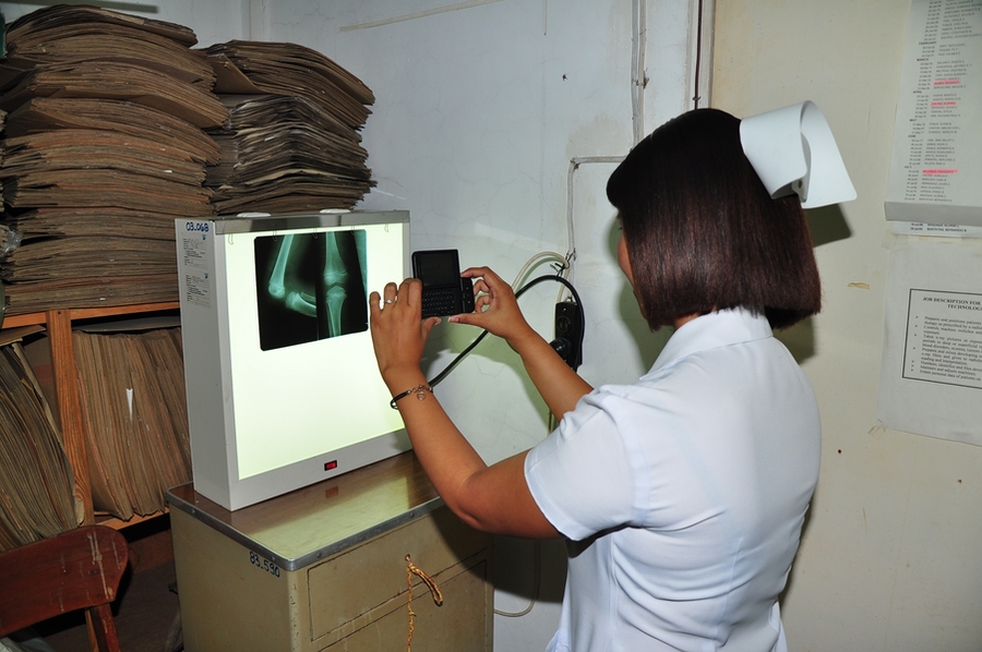 A nurse in the Batanes Provincial Hospital uses Moca to upload a patient's X-ray as a
teleradiology case.
