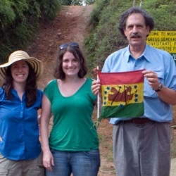 Professor James Howe (holding the Kuna flag) and graduate students at the entrance to Kuna territory.