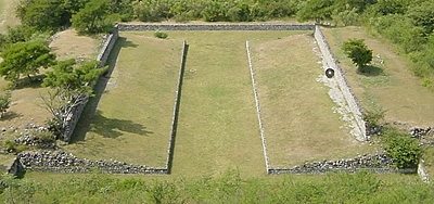An image of a ball court at Xochicalco, a pre-Columbian archaeological site in the western part of the Mexican state of Morelos.