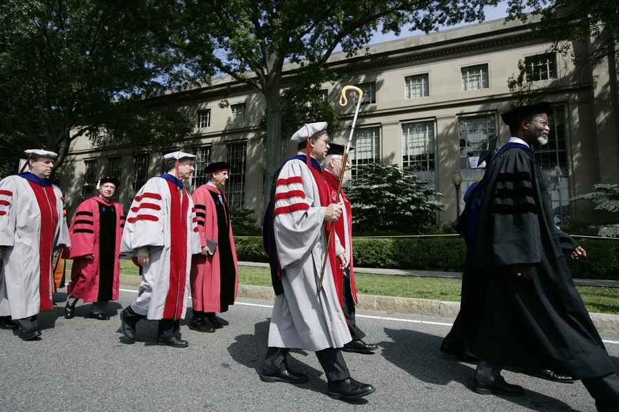 The Commencement procession begins makes its way toward Killian Court along Massachusetts Avenue.