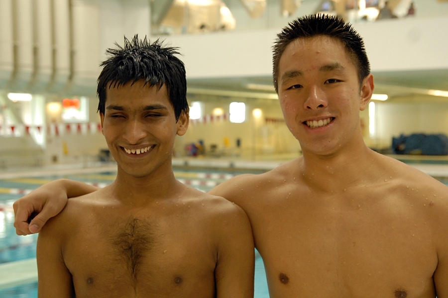 Srikanth Bolla ’13 with Kevin Hsuie ’13, one of four volunteers from the MIT swim team who helped Bolla in swim class. 