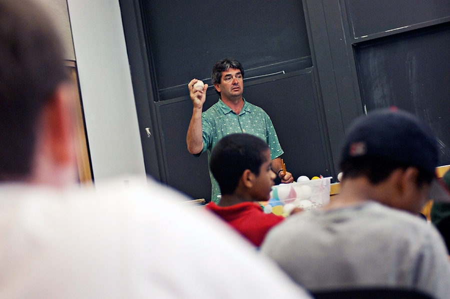 Andy Andres, the head coach and program instructor, teaches students about aerodynamics and how the principles of drag and lift apply to a baseball.