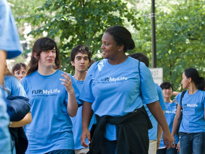 Participants in the Freshman Urban Program (FUP), which organizes community-service activities, walk down Massachusetts Avenue on their way to Cambridge City Hall.