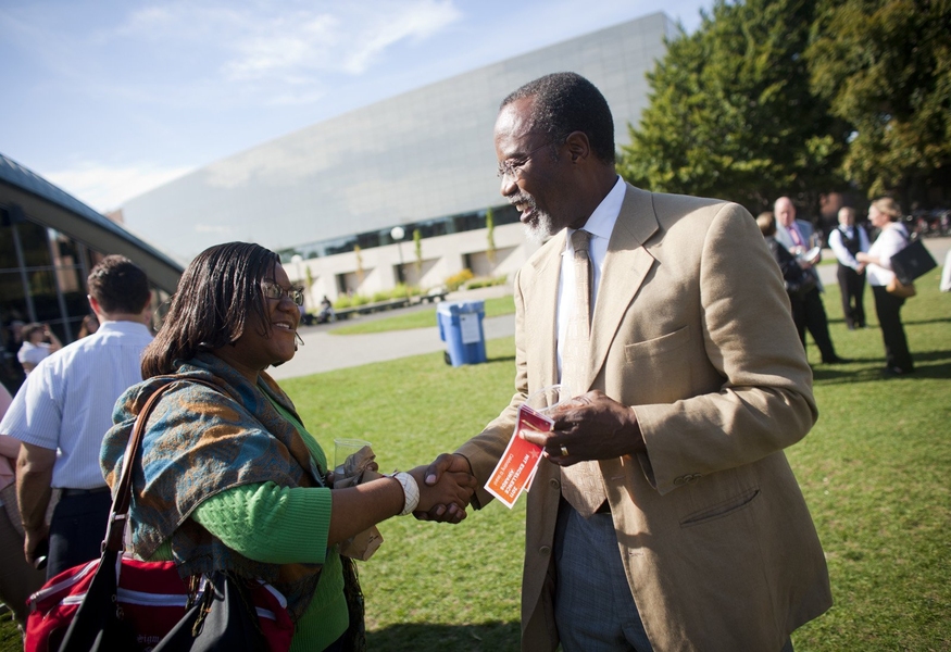 Chancellor Phillip Clay talks with Mellisa Thompson, a residence life associate at MIT.