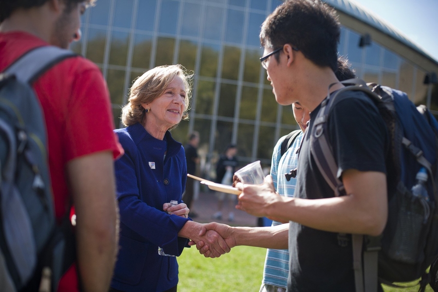 President Hockfield greets MIT juniors, from left, Ilya Volodarsky, Calvin French-Owen, David Jia, and Danny Yuan.