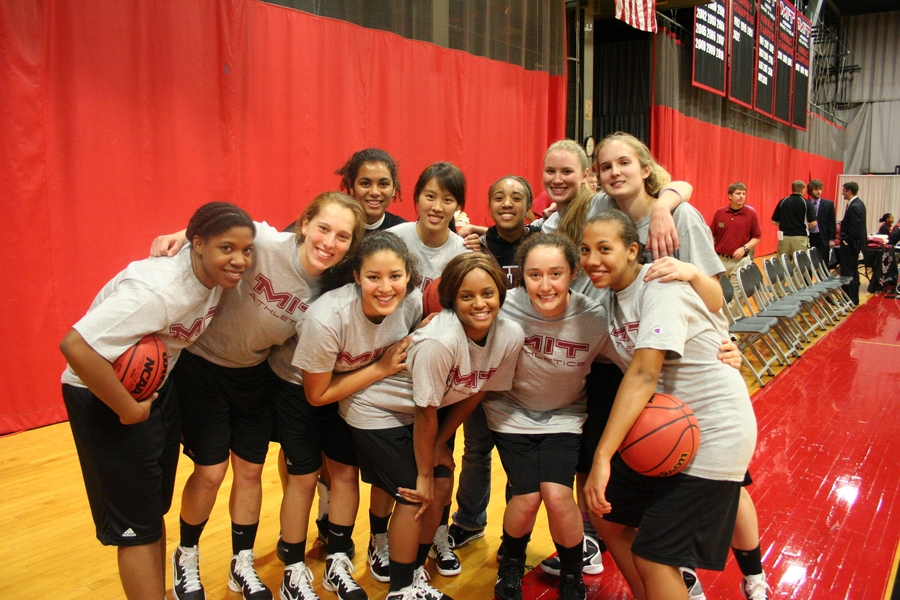 The 2010-2011 women’s basketball team huddles before taking the court to warm-up. 