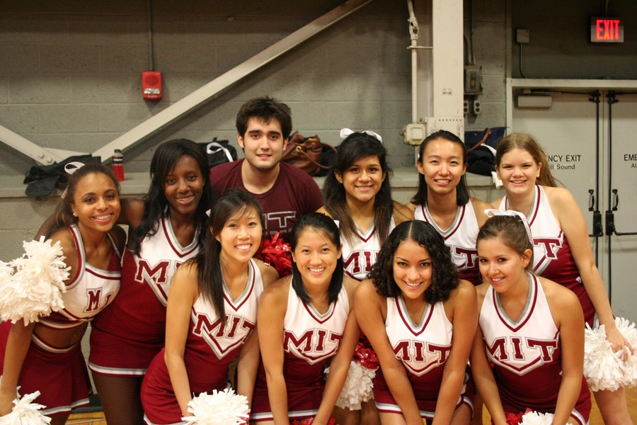 The MIT cheerleaders helped motivate the crowd. One of their more popular cheers is leading the crowd in spelling out, including the spaces, “Massachusetts Institute of Technology.” 