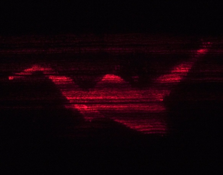 This image shows the final product of the holographic video setup: a paper crane transmitted from the Kinect camera through a PC into the holographic display.
