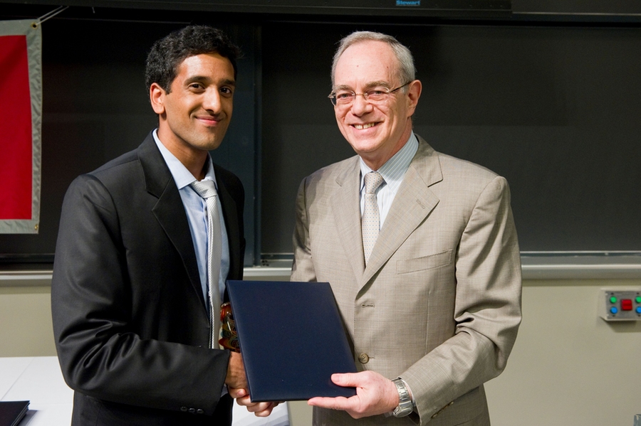 Provost L. Rafael Reif presents the 2010 Laya & Jerome B. Wiesner Student Art Award to Balaji Mani ’10. 