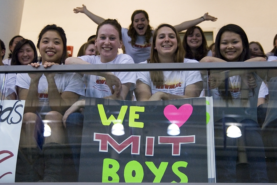 The MIT women's swimming team--which this month won the NEWMAC conference championship for the first time in school history--came out to support the men. Calley Murphy '14 (rear) pops up behind (from left) Joanna Yeh '14, Christy Rogers '14, Katelyn Rossick '14, and Elina Hu '13.