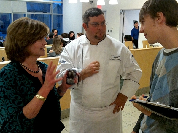 MIT sophomore Michael Plasmeier, right, discusses the Roger Williams University dining program with Bon Appetit regional manager Elaine Smart and Director of Culinary Operations Robert Lavoie.