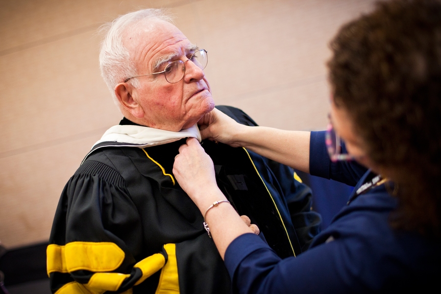President emeritus Paul Gray gets ready to join the procession.