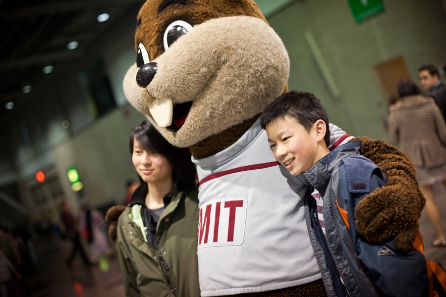 MIT Athletics mascot Tim the Beaver posed for photos with attendees during a reception after the event.