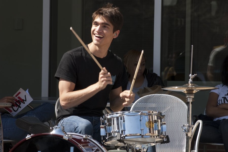 Senior Kevin Rustagi entertains the crowd outside of the Zesiger Center with his bandmates from Live Music Connection (LMC), one of the many MIT student clubs that showcased their talents and passions during CPW.