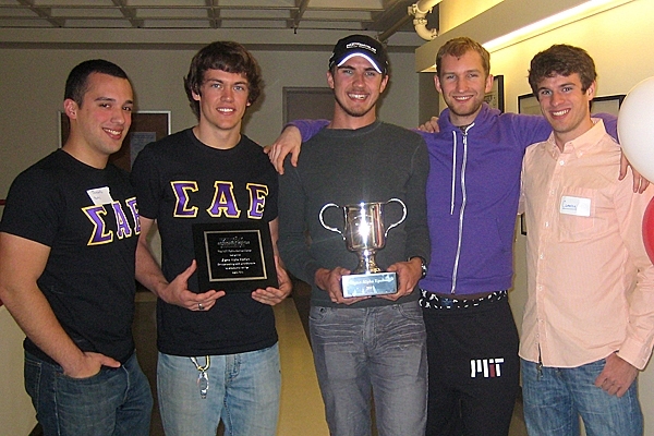 Brothers from Sigma Alpha Epsilon fraternity hold the 2011 Service Cup. From left: sophomore Jancarlo Perez, junior Davey Hunt, and sophomores Scott Landers, Will Drevo and Cameron McAlpine.