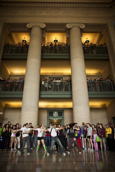 Students perform during the flash mob in Lobby 7.
