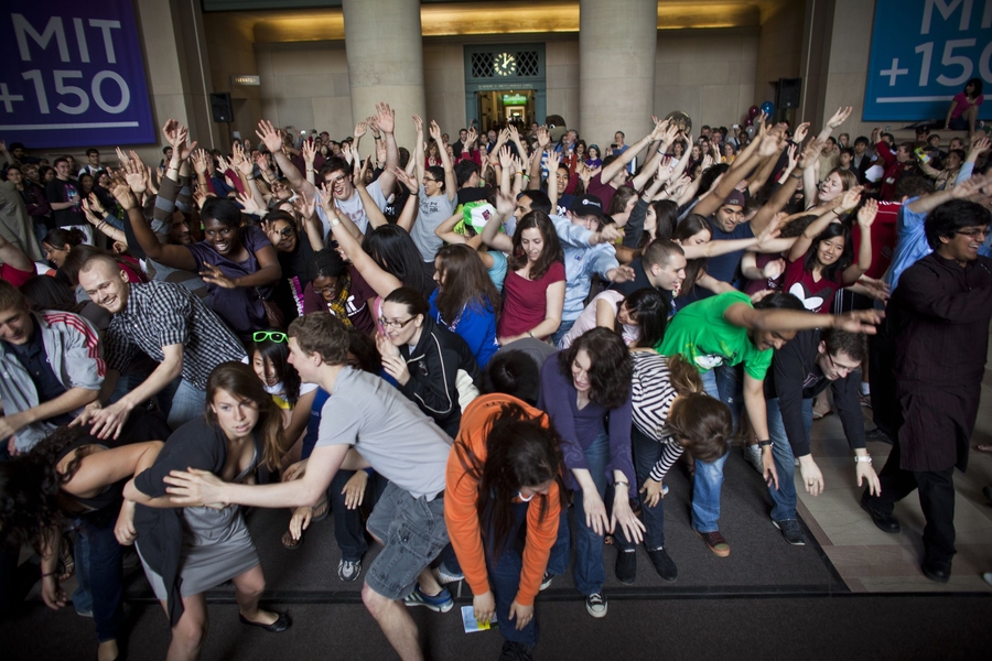 Students perform during the flash mob in Lobby 7.