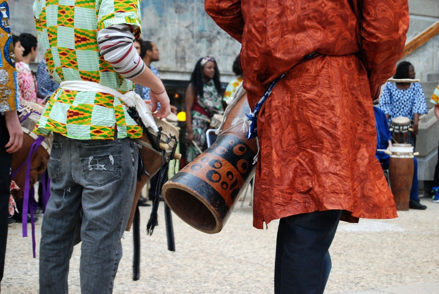Rambax drumming ensemble members with their traditional Senegalese sabar drums.