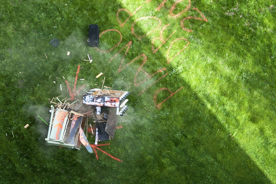 The piano hits the ground — and another piano placed as a target — at the annual Baker House Piano Drop. A challenge every year is aim: will the piano hit the target?
