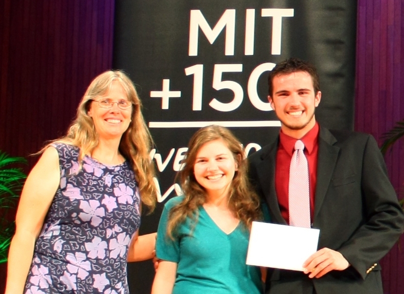 Senior Lecturer Amy Smith presents an IDEAS Juried Award to Team Biodiesel represented by students Angela Hojnacki and Scott Landers.