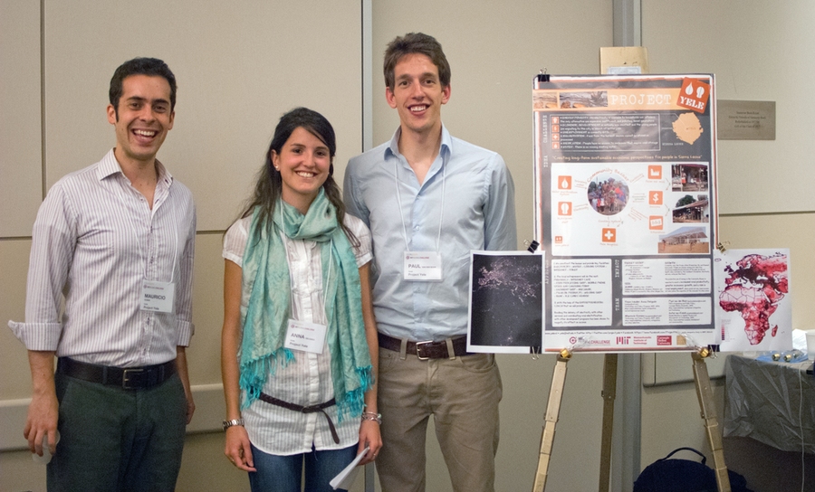 Team Project Yele working on developing a market bazaar in Sierra Leone presents their idea to judges at the poster and judging session.