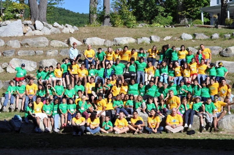 The counselors and campers pose for their group photo.