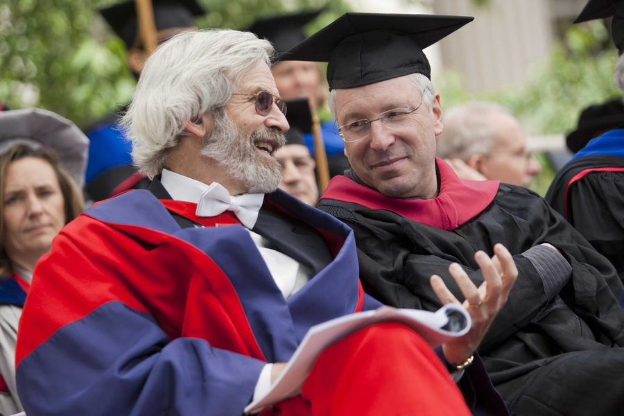 Professors Linn Hobbs, left, and Tom Levenson talk on stage prior to the ceremony's start. 