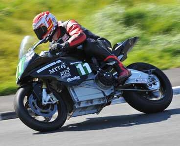 Rider Allan Brew takes the eSuperbike for a test drive during a qualifying round