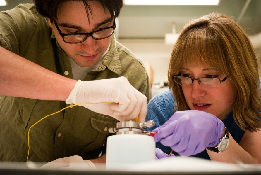 two people work in lab