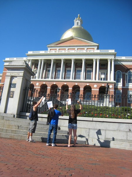 SimTREK champions mimed a protest in front of the Massachusetts State House as part of their winning campaign.