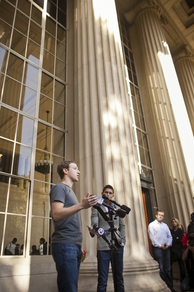 Zuckerberg briefly took questions from press on the steps of Killian Court.