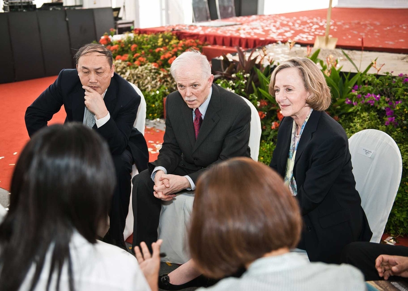 Hockfield and Zhejiang University (China) President Wei Yang, left, listen as SUTD President and MIT Institute Professor Thomas Magnanti speaks with members of the press following the groundbreaking ceremony.