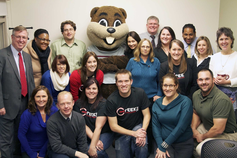 Many Residential Life staff members posed for a photo in their new office.