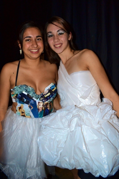 The designers drew inspiration from a variety of sources. While sophomore Tara Ebsworth, left, got the idea for her fused-shopping-bag dress from broken glass in Harvard Square, sophomore Nilu Zhao based the dress worn by freshman Kirstyn Hein, right, off of Alexander McQueen’s fall/winter 2011 wedding collection.