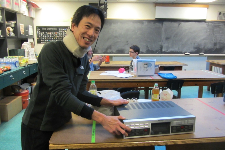 Doug Ling SM ’87 with the first-generation Revox CD player found at the Town of Wellesley Dump.