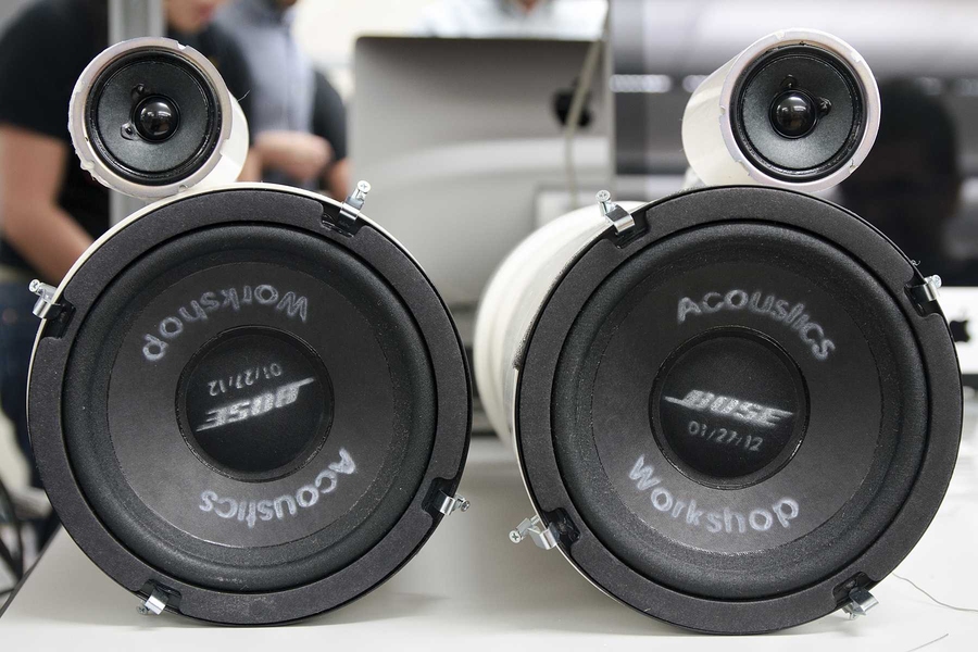 A finished pair of speakers, each housed in PVC pipe. Bose supplied students with all the components they would need for the workshop.