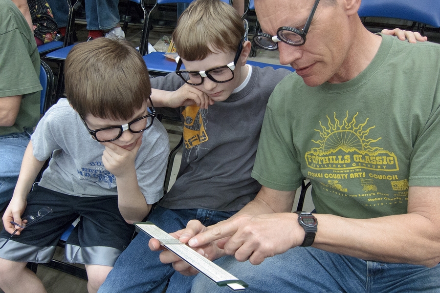 One Roanoke family with no connection to MIT was so intrigued by the Engineers success in the tournament that they decided to come to the game to root for Tech with taped-up glasses and a slide rule.
