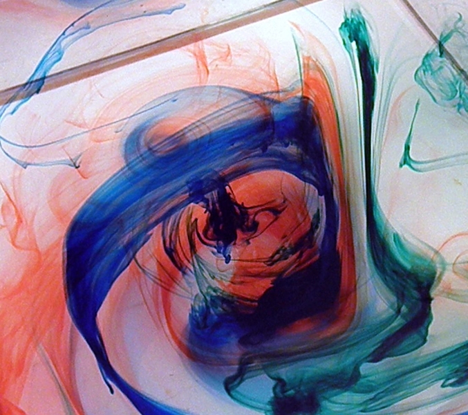 The 'weather in a tank' curriculum includes several rotating tank experiments, which are designed to help students understand how Earth's atmosphere and oceans work. An image from the dye stirring experiment is shown here.