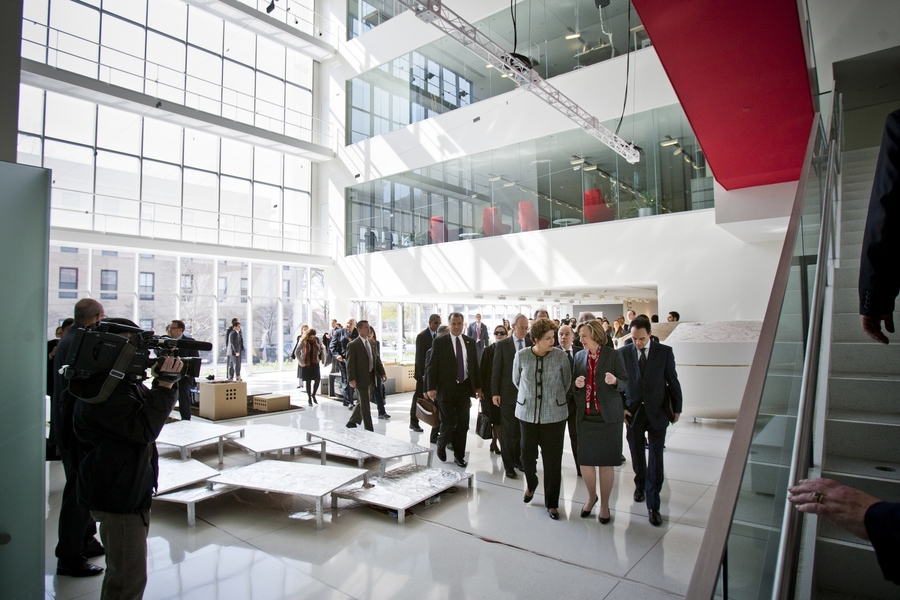 Brazilian President Dilma Rousseff and MIT President Susan Hockfield walk through the lobby of the MIT Media Lab. 