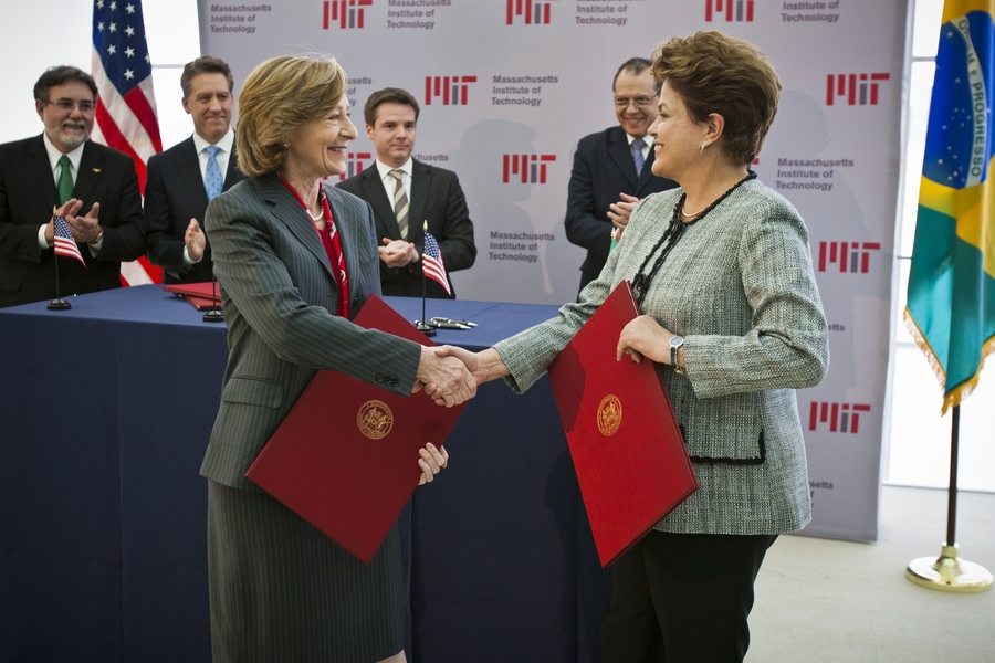 Hockfield and Rousseff shake hands after signing a letter of intent between MIT's School of Engineering and ITA, committing to work together over the next six months to evaluate the possibility of a future collaboration.