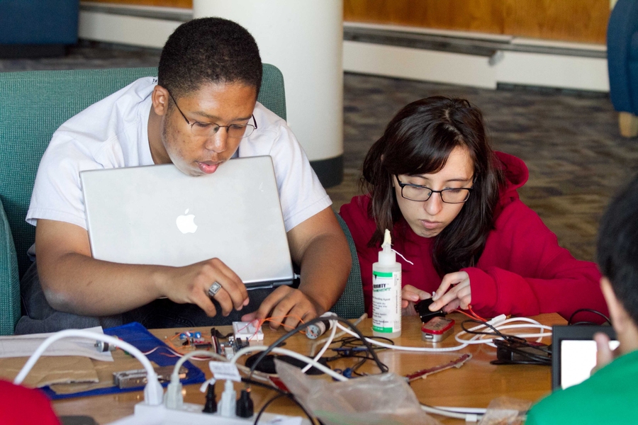 MIT senior and Next Make President Marcel Thomas works on a project alongside sophomore Anna Waldo. Next Make is comprised mostly of Next House students studying mechanical engineering, electrical engineering and computer science, but the group is open to all students across campus.