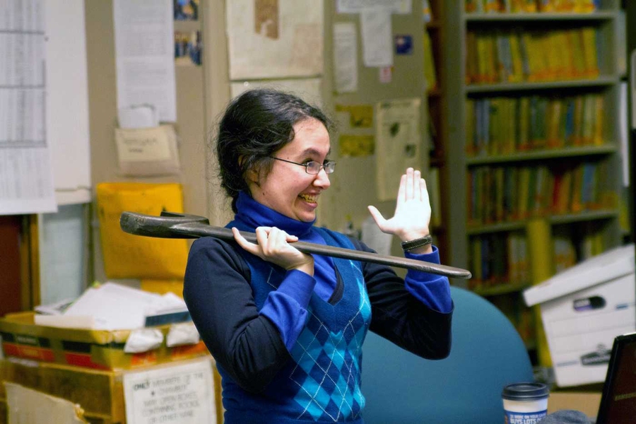 Standing in for the Society 'skinner' (president), pseudo-Skinner Lee Fuchs calls to order a Society meeting using the large iron wrench that serves as the group's gavel. While they rarely impact actual policy, the quirky meetings serve as energetic gatherings for some of the most dedicated members.