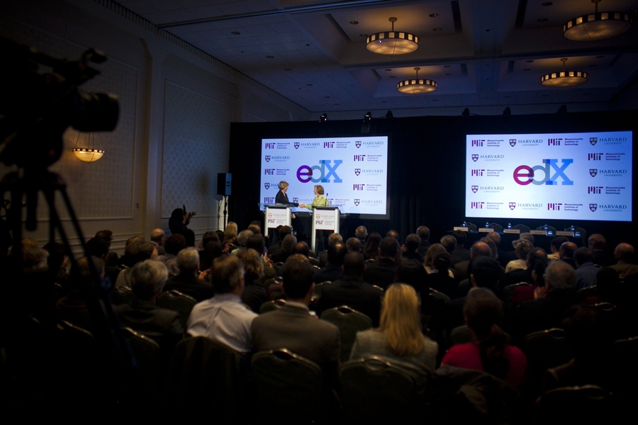 Harvard President Drew Faust (left) shakes hands with MIT President Susan Hockfield at the conclusion of their remarks at the joint MIT-Harvard press conference announcing the creation of edX.